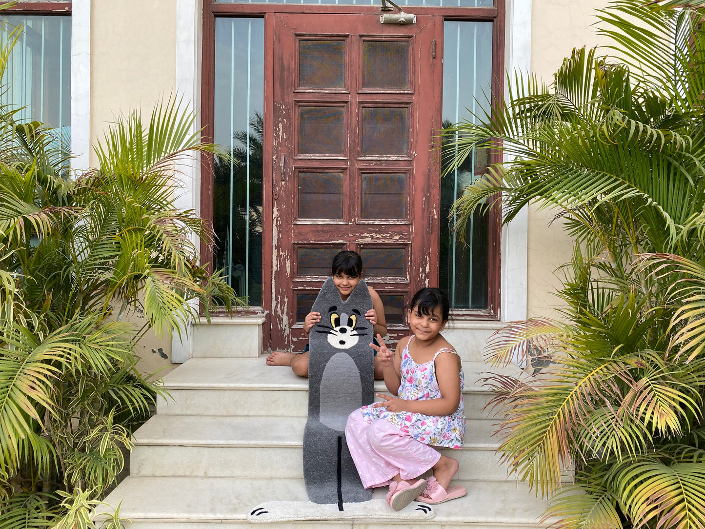 kids with a custome made tom rug in grey by rich class decor