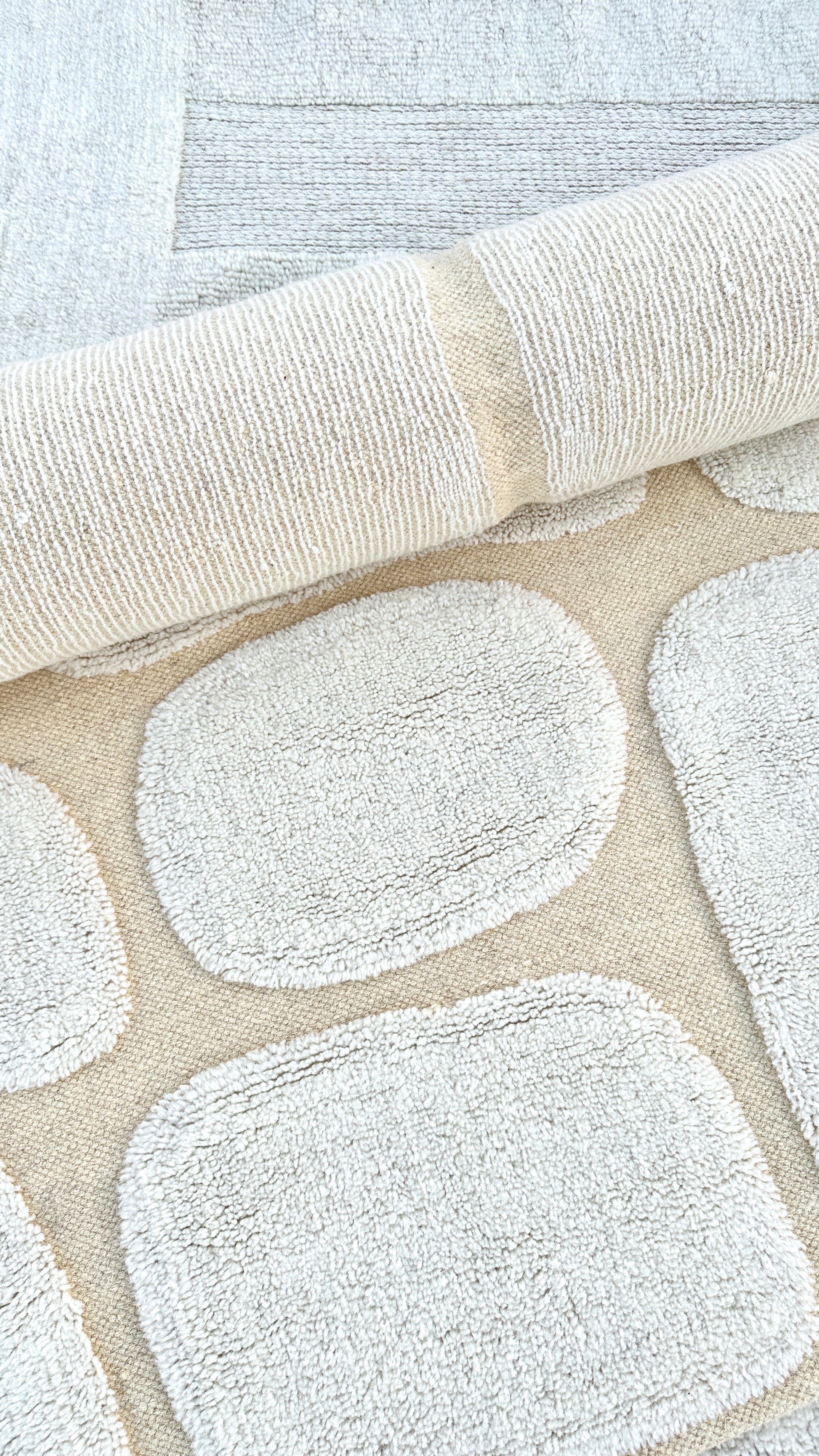 Close-up of Emily Rug's plush pile texture, 100% New Zealand wool