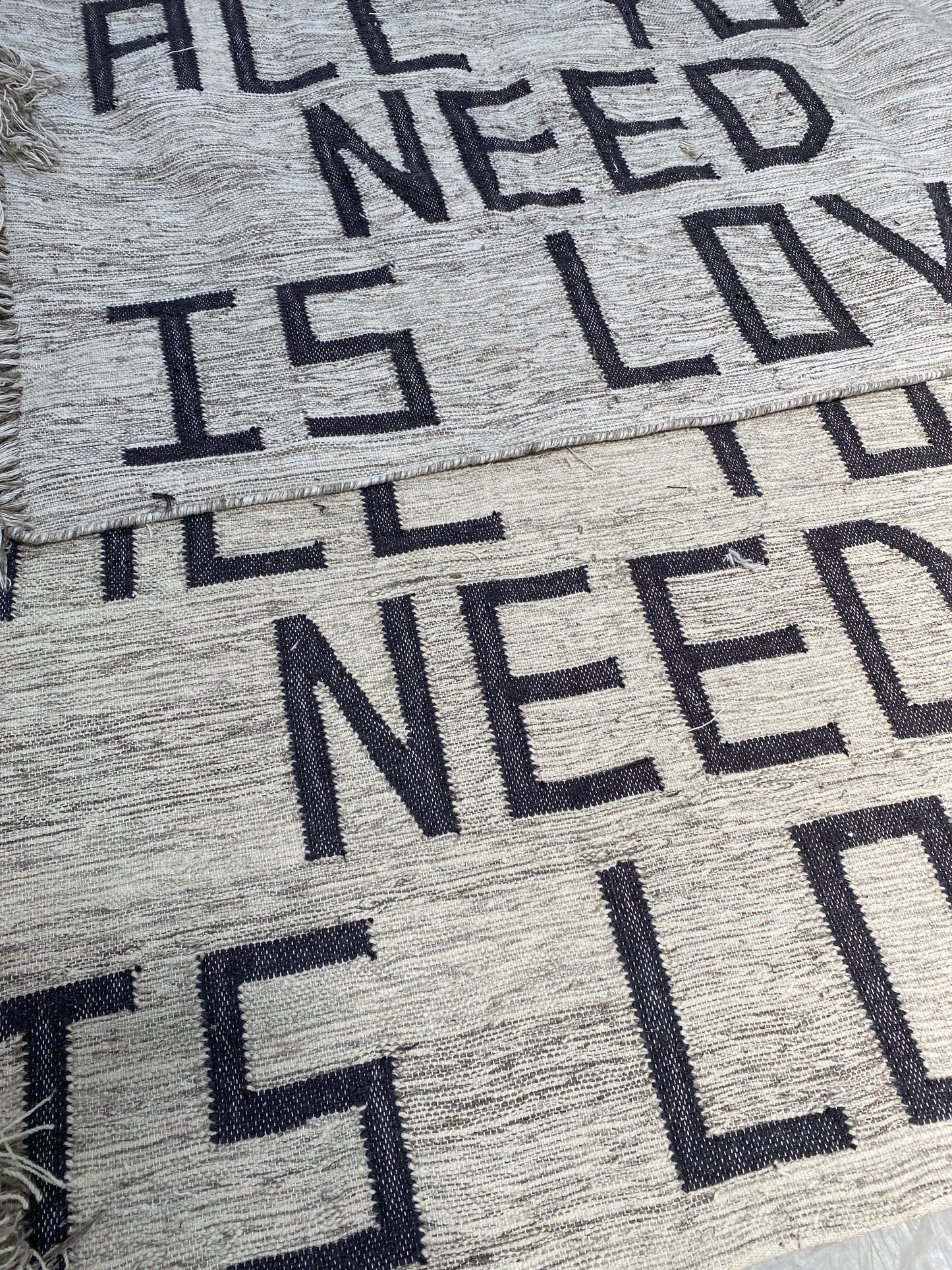 positive affirmation rugs being woven