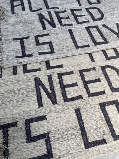 positive affirmation rugs being woven
