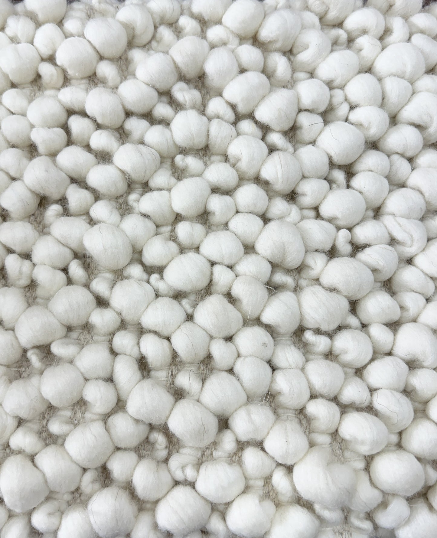 close up of boucle new zealand wool rug