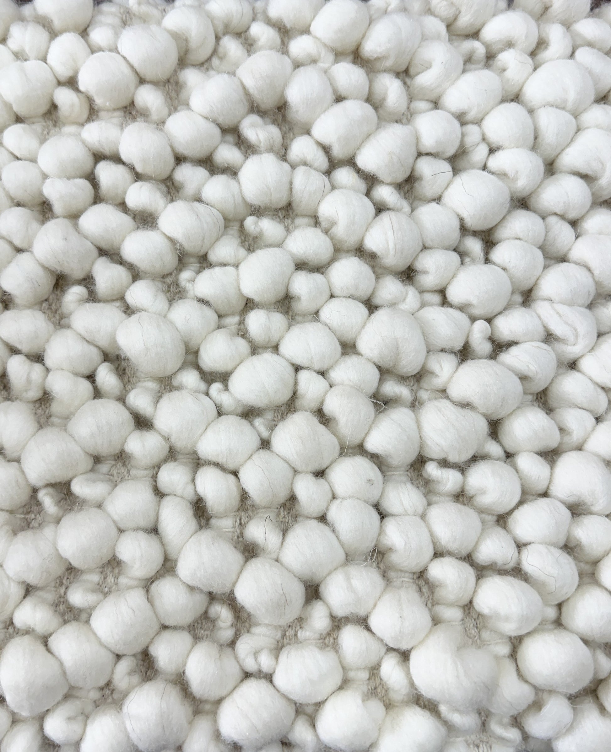 close up of boucle new zealand wool rug