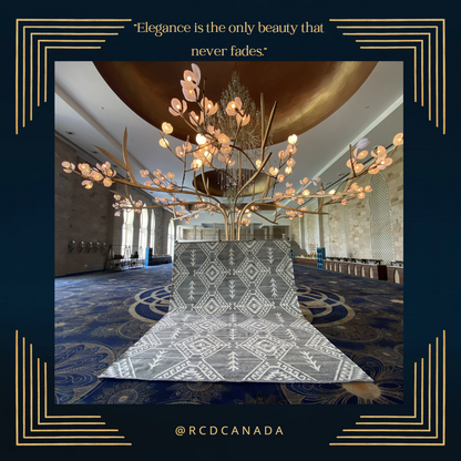 Luxury handcrafted kilim rug with intricate geometric patterns in a grand hall setting. Ethically made and sustainably sourced, this boho-chic rug from Rich Class Decor adds elegance and sophistication to any interior. Perfect for high-end home decor, hospitality spaces, and luxury interiors.