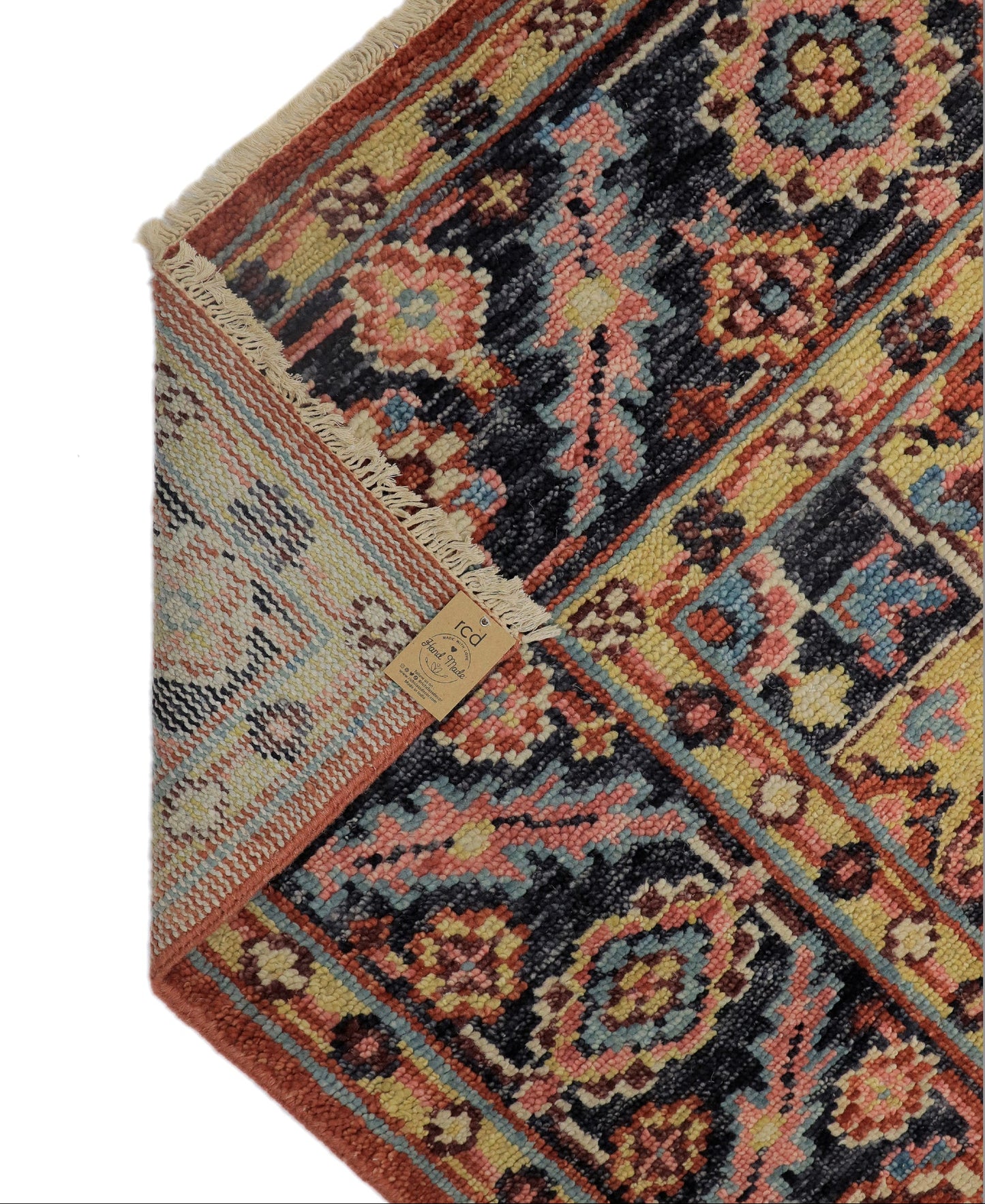 Backing of hand-knotted Oushak medallion rug showing individual knot density and cotton foundation  Rich Class Decor