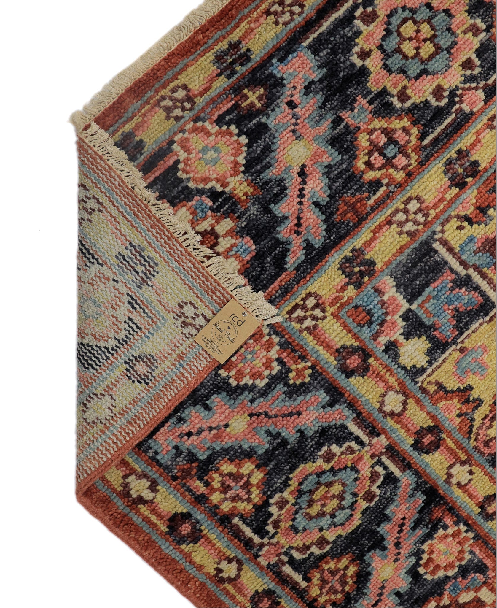 Backing of hand-knotted Oushak medallion rug showing individual knot density and cotton foundation  Rich Class Decor