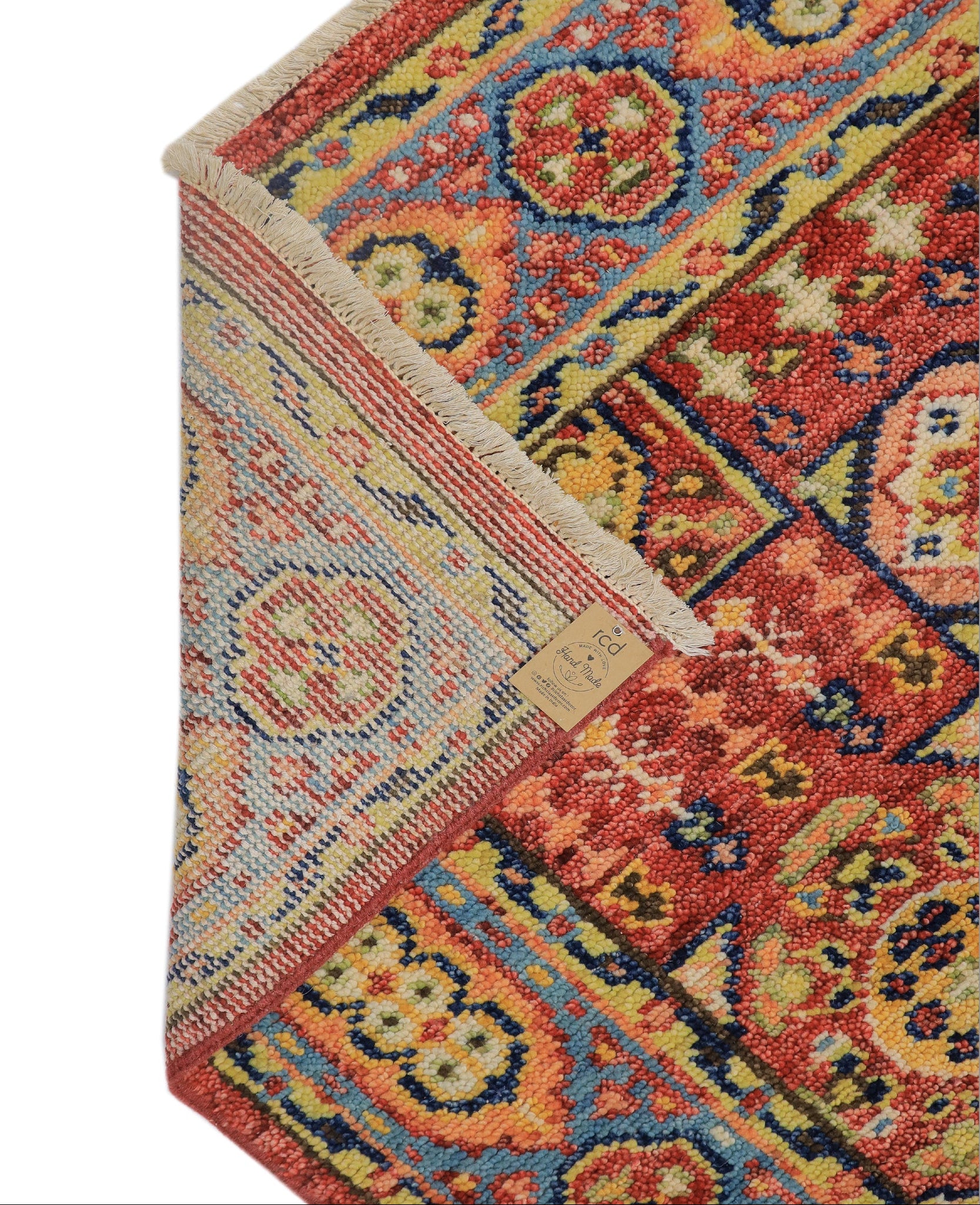 Backing of hand-knotted wool rug showing tight knot density and cotton foundation