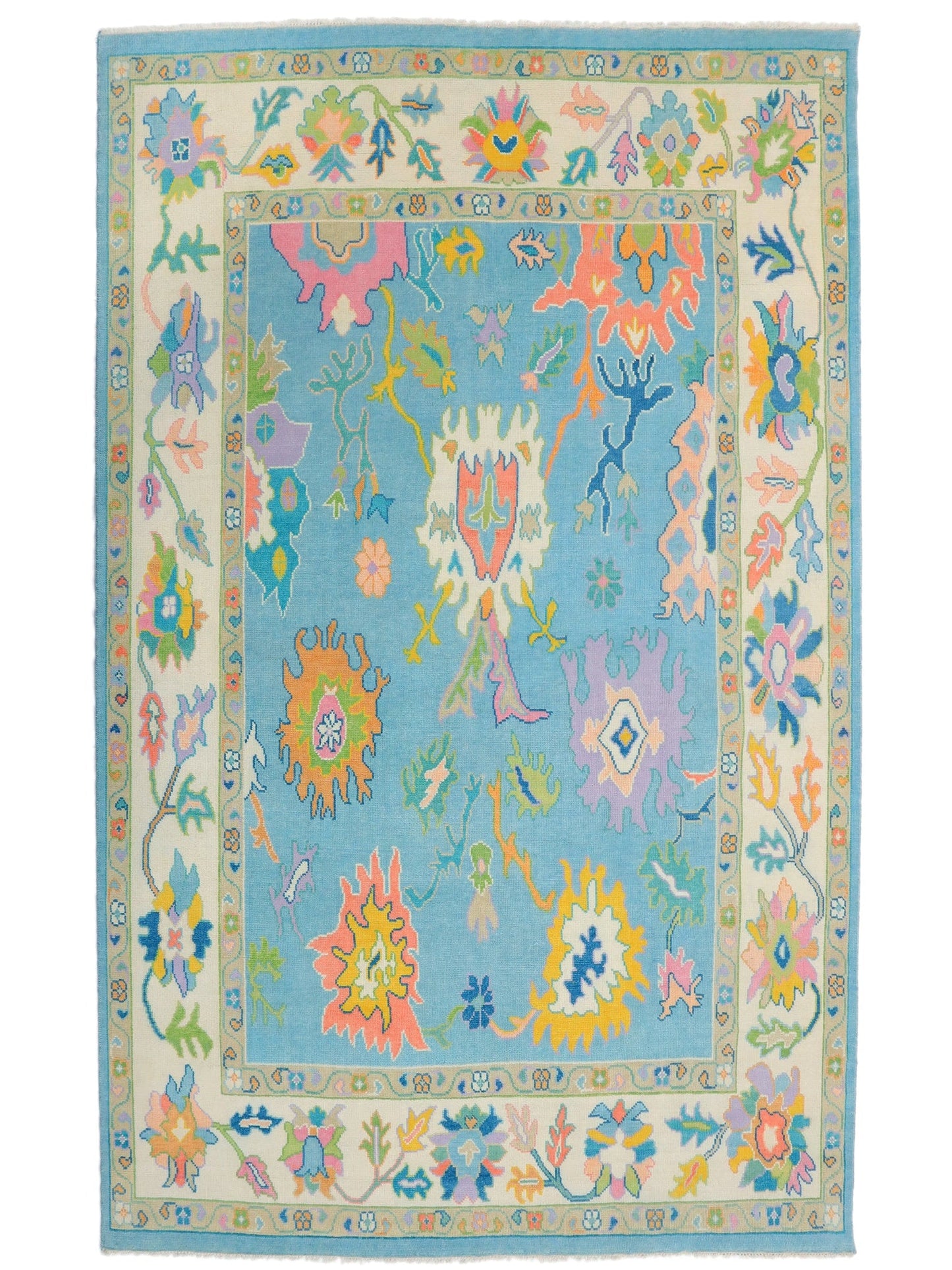 Hand-knotted Oushak sky blue wool area rug full view — open field botanical design, ivory and gold accents