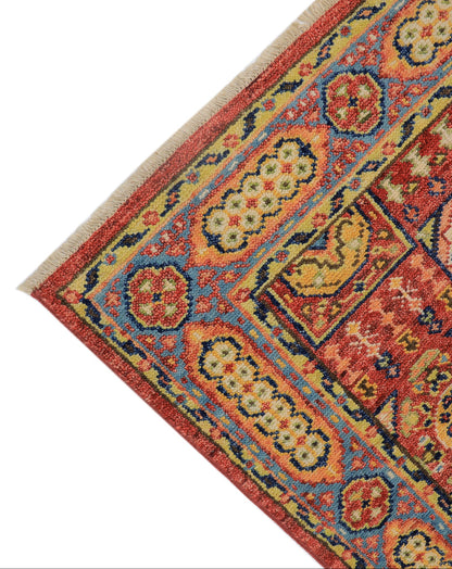 Close-up detail of hand-knotted Oushak Persian medallion pattern with natural dye wool