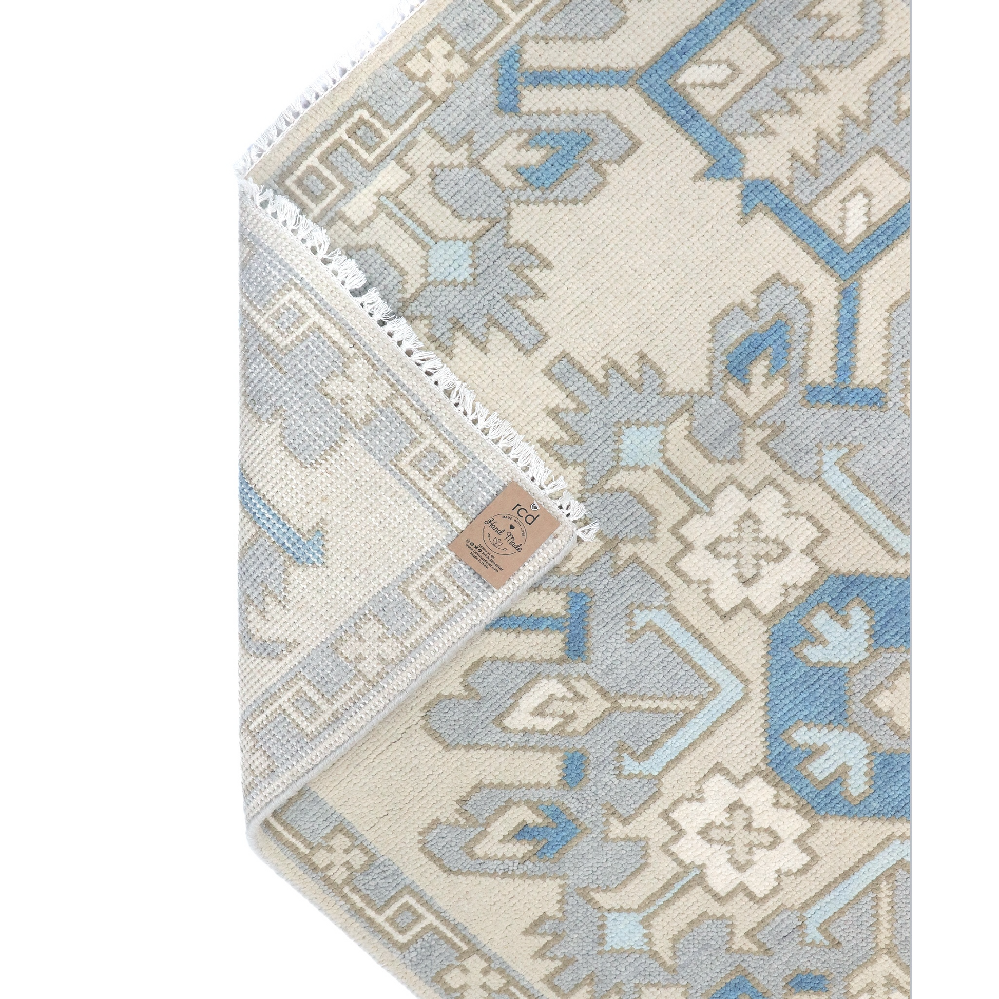 runner rug with geometric pattern on a plain background