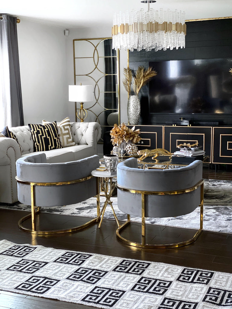Handwoven wool rug in greek key design in a stunning glam home style room