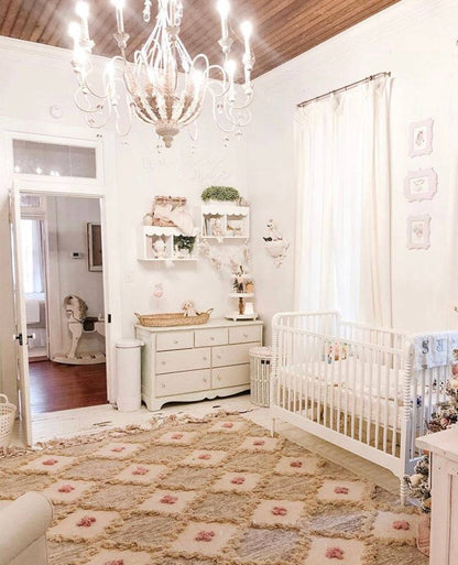 Custom Natalie rug with pink highlight in a nursery room