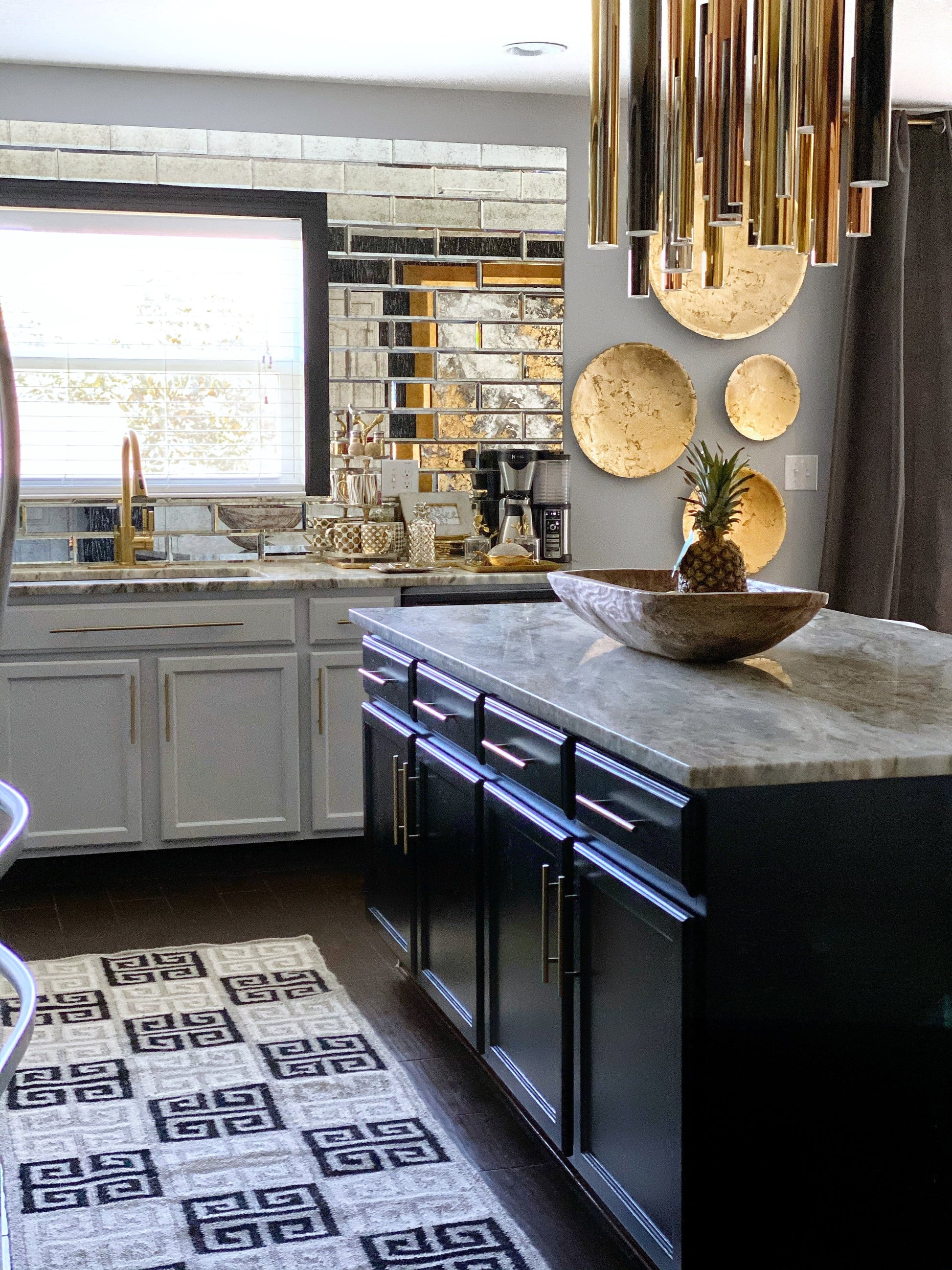 greek key design rug in glam home kitchen