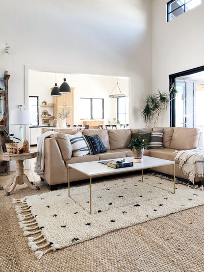 Holly rug layered in a stunning living room